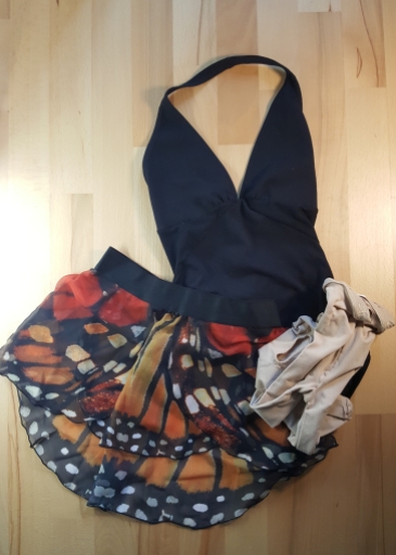 A Mirella leotard, a Maldire dancewear skirt and Capezio flesh coloured tights.